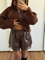 short ecopelle e pizzo